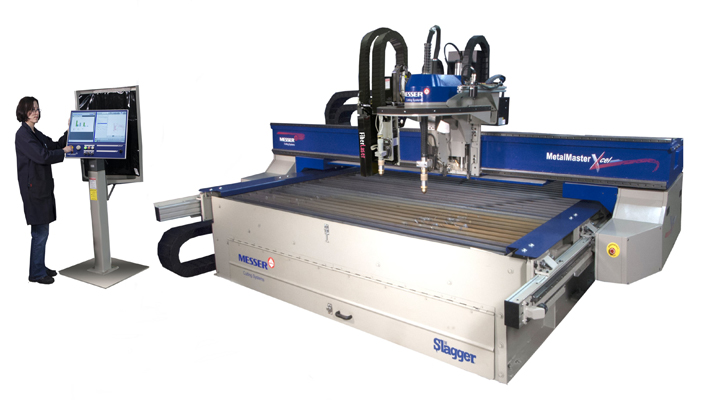 A woman operating a MetalMaster Xcel machine from Messer.